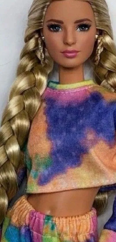 Colorful fashion doll with braided hair in vibrant clothing.