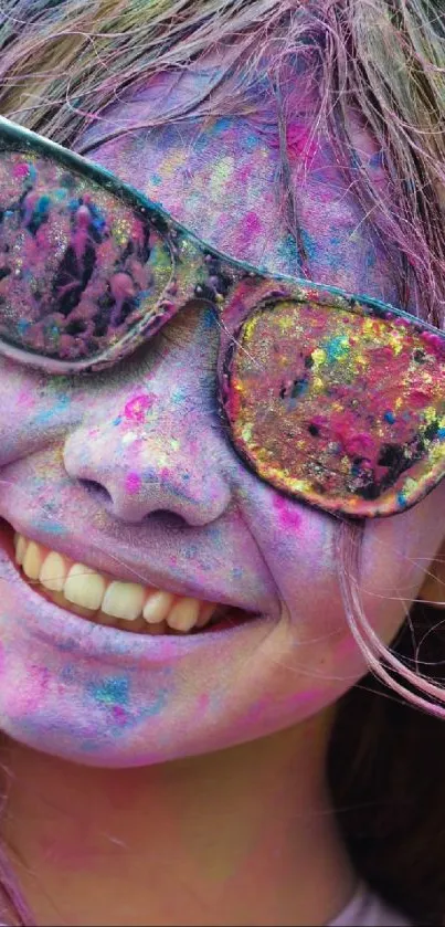 Colorful artistic face with powder on smiling woman.