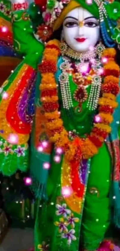 Colorful festive mobile wallpaper featuring a divine figure in green attire.