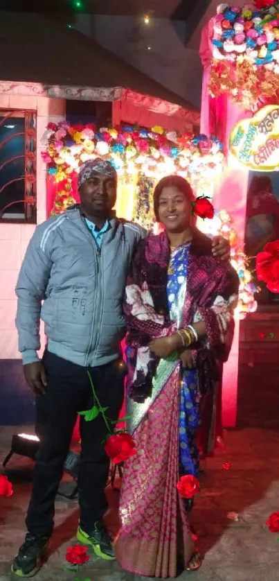 People in traditional attire amid roses at a festival.