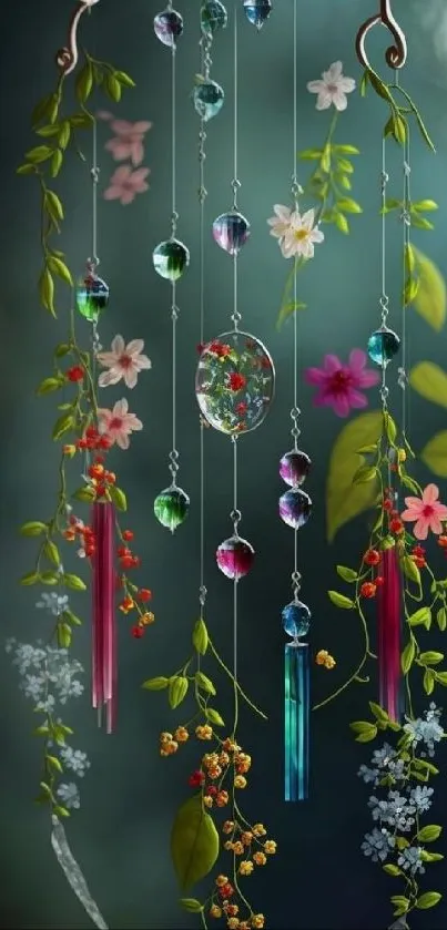 Colorful floral mobile with crystals on dark background.