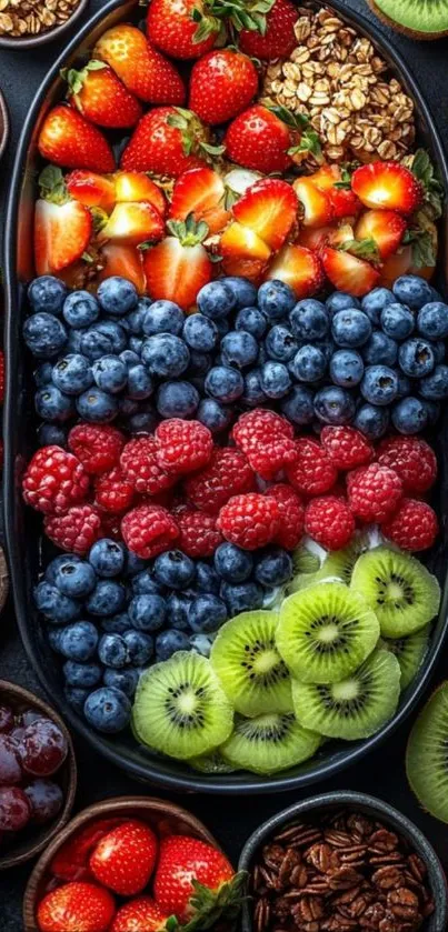 Colorful assortment of fresh fruits in a lively platter arrangement.