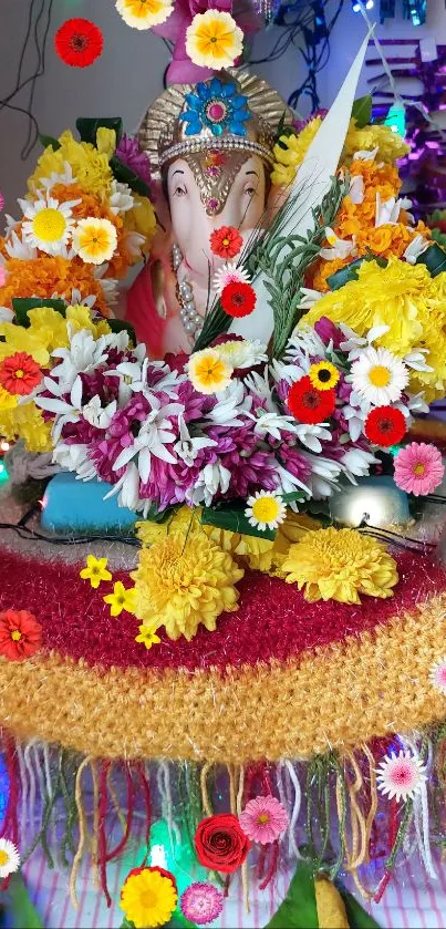 Vibrant Ganesh festival altar with colorful floral decor.