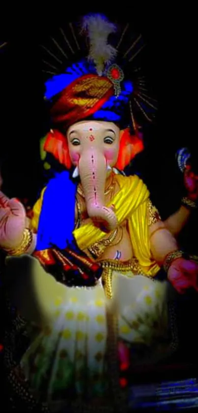 Vibrant Ganesha deity in colorful attire on a black background.