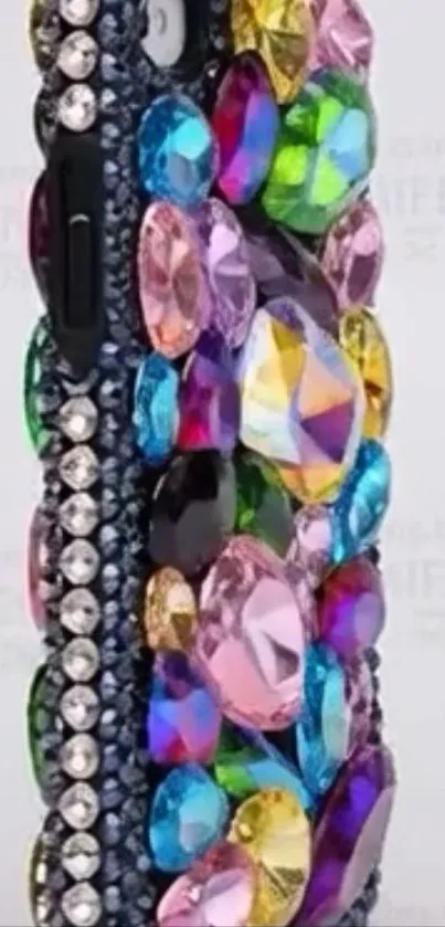 Gemstone-studded colorful phone case with vibrant design.