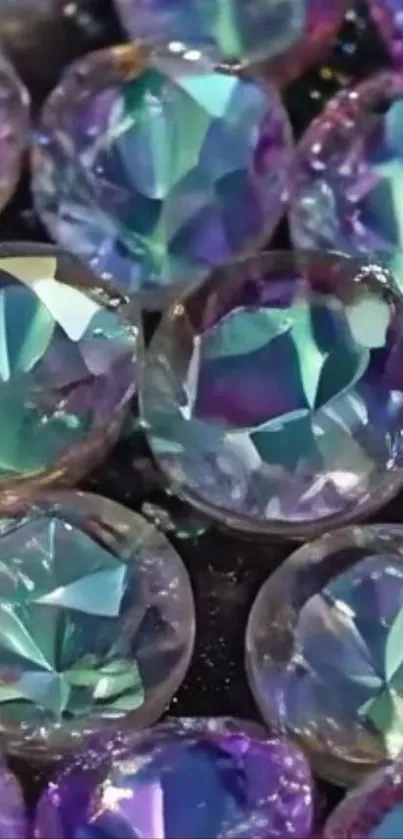 Vibrant iridescent gemstones with a sparkling reflection on black background.