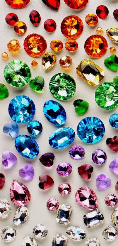 Vibrant rainbow gemstone mobile wallpaper with multicolored jewels cascading by size.