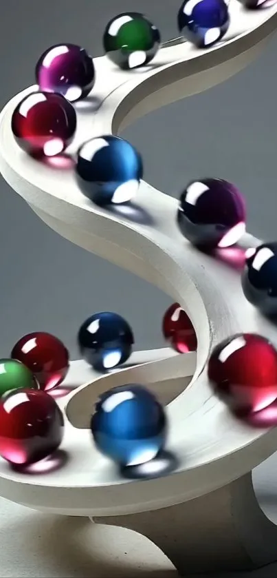 Colorful glass marbles on a spiral sculpture in a modern art design.