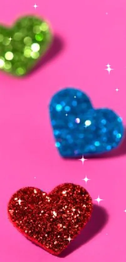 Colorful glitter heart shapes on a vibrant pink background.