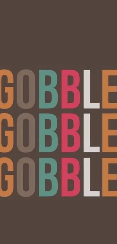 Colorful 'Gobble' text on dark brown background wallpaper.