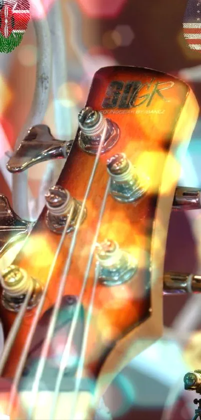 Colorful guitar headstock with bokeh effect and vibrant lighting.