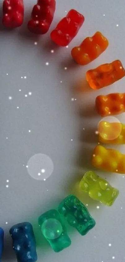 Spiral of colorful gummy bears on a white background.