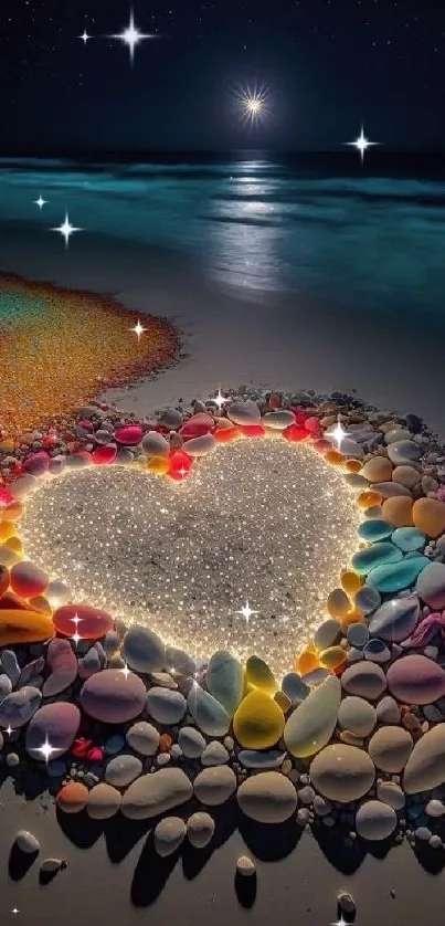 Heart-shaped arrangement of colorful stones on a nighttime beach, glowing under stars.