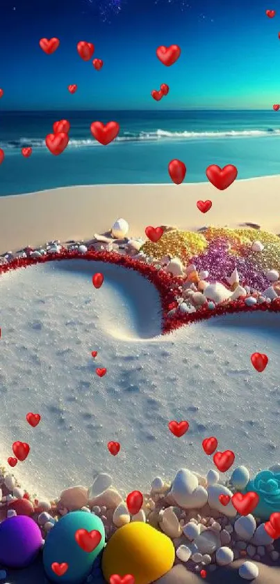 Heart-shaped sand with colorful stones on a beach at night.