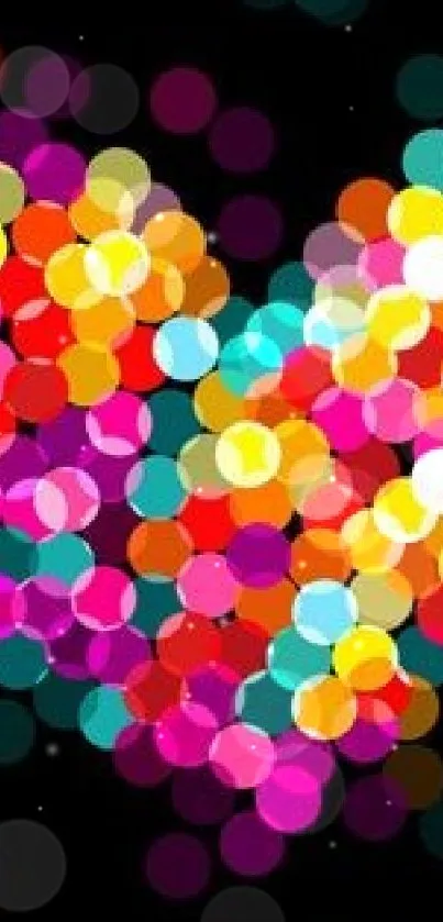 Colorful heart bokeh with vivid circles on dark background.