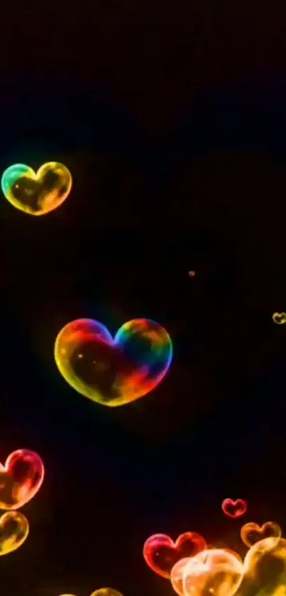 Colorful heart-shaped bubbles on dark background, vibrant and lively.