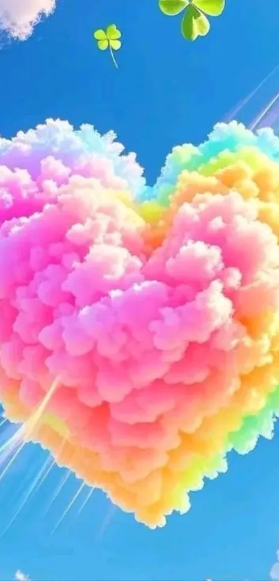 Vibrant heart-shaped rainbow cloud in a blue sky.