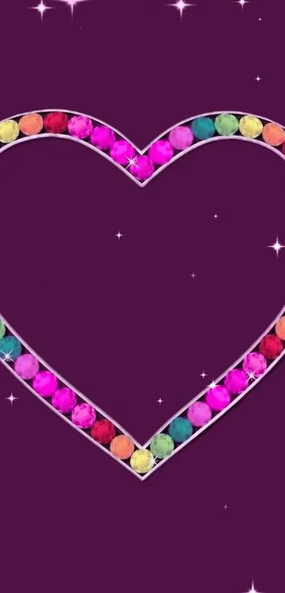 Heart-shaped colorful gemstone on purple background wallpaper.