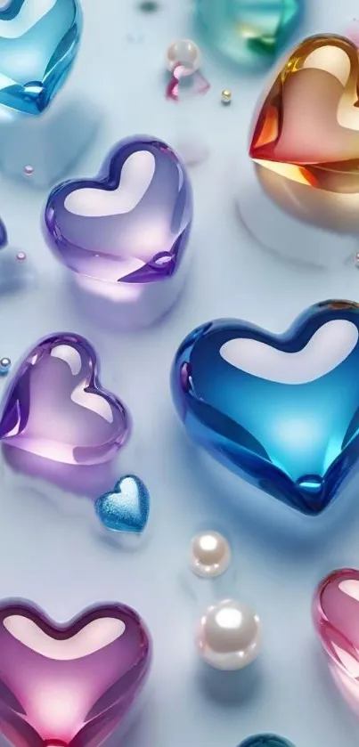 Colorful glass hearts on a light blue background, perfect for a vibrant phone wallpaper.