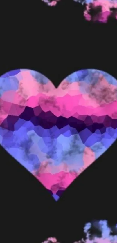 Multicolored heart on dark background phone wallpaper.