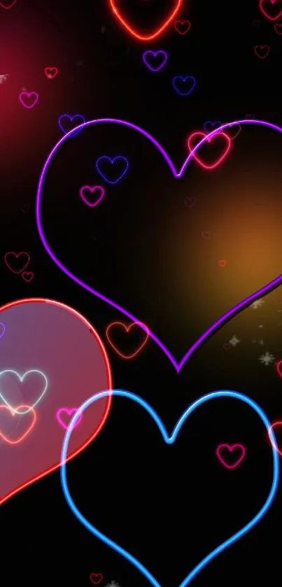 Colorful neon hearts on dark background wallpaper.