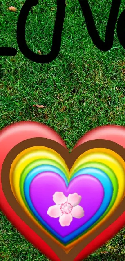 Colorful heart with love text on green grass wallpaper.