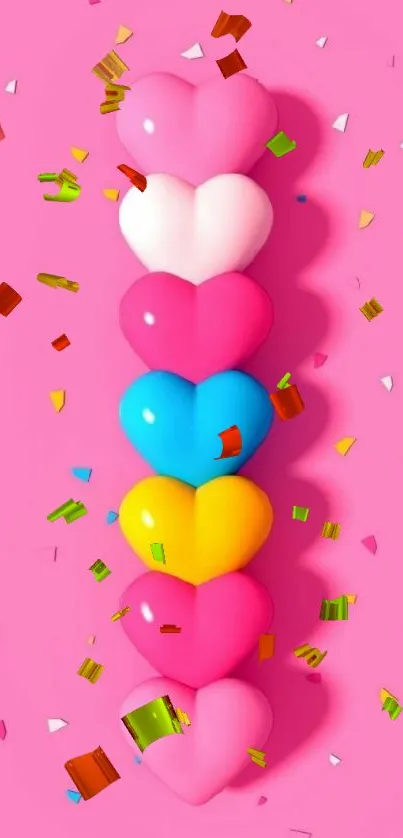 Row of colorful hearts on pink background.