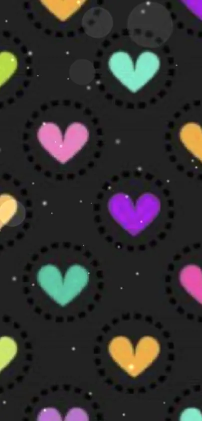 Colorful hearts on black wallpaper background for mobile phones.