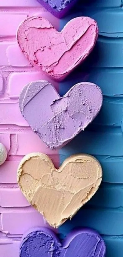 Multicolored hearts on a vibrant brick background.