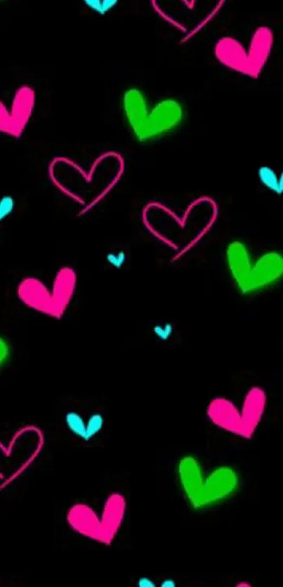 Bright neon hearts on a black background wallpaper.