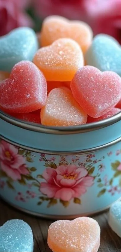 Heart-shaped colorful candies in a floral tin.