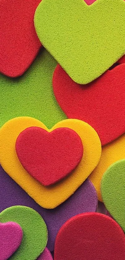 Colorful heart shapes in red, green, yellow, and purple on a mobile wallpaper.