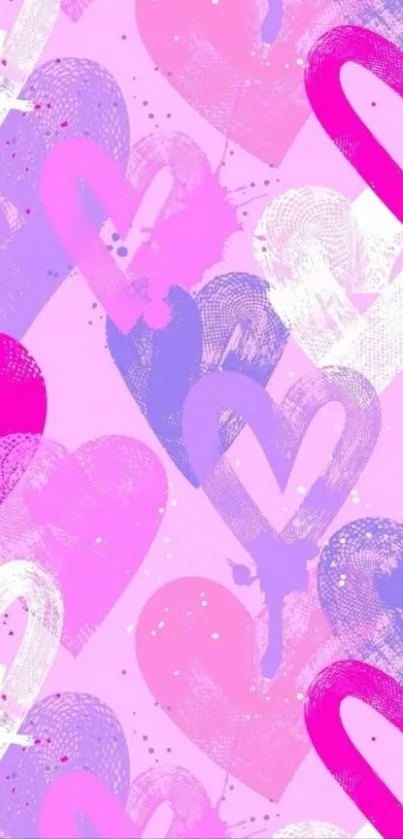 Colorful hearts pattern wallpaper in pink hues.