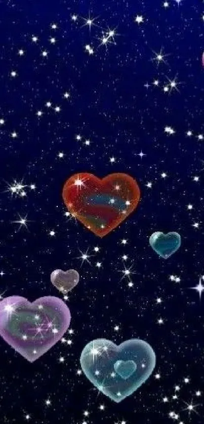 Colorful hearts floating in a starry blue night sky wallpaper.