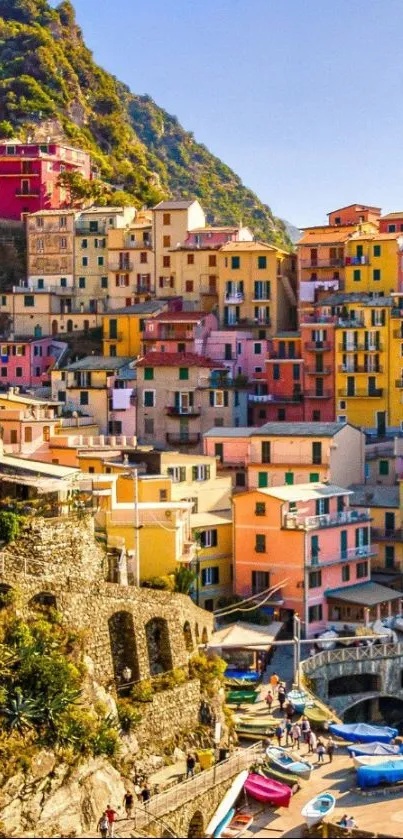 Brightly colored hillside village wallpaper with picturesque houses.