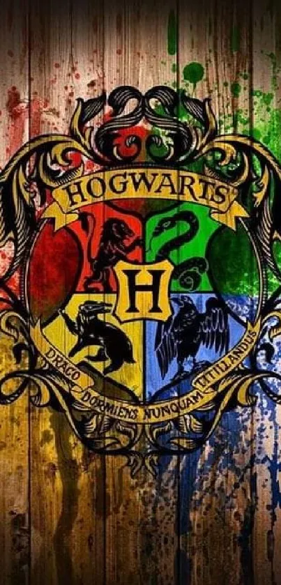 Colorful Hogwarts crest splattered on wood background.