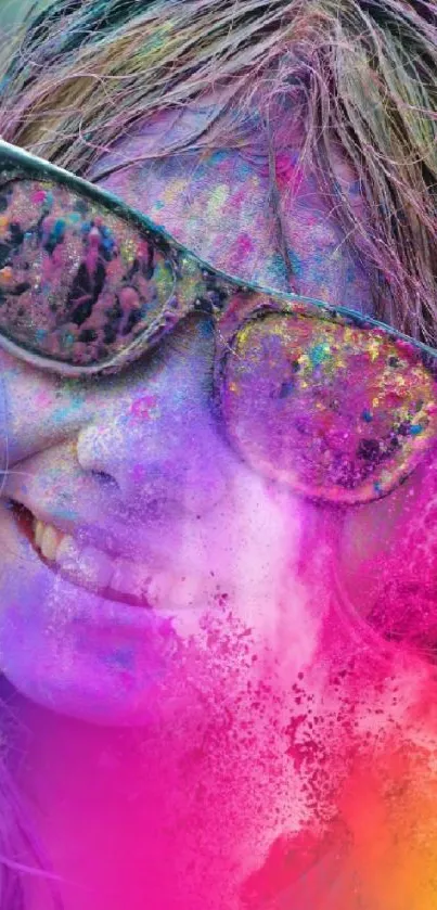 Vibrant Holi festival wallpaper with colorful powder explosion and smiling face.