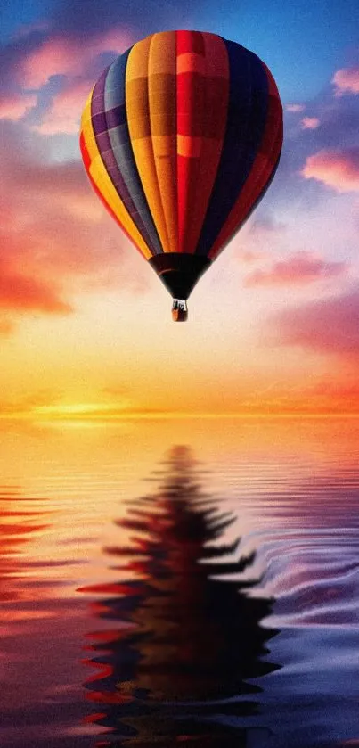 Colorful hot air balloon above sunset waters.