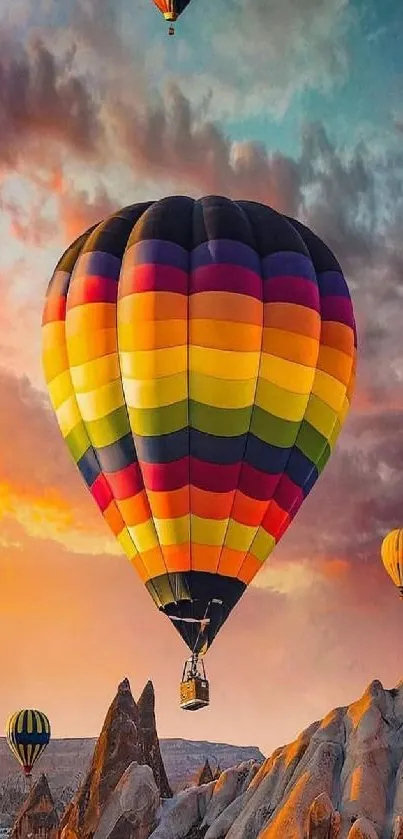 Colorful hot air balloons against a vibrant sunset sky.