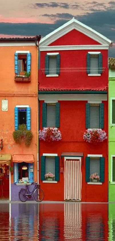 Vibrant colorful houses reflecting in water.