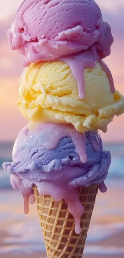 Triple scoop ice cream cone at beach sunset.