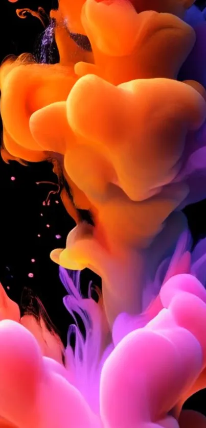 Colorful ink cloud on a dark background, blending orange, pink, and purple hues.