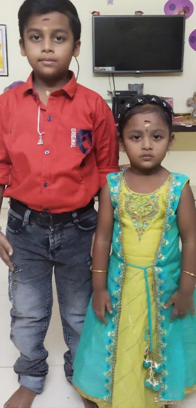 Kids in colorful outfits posing indoors with vibrant decor.