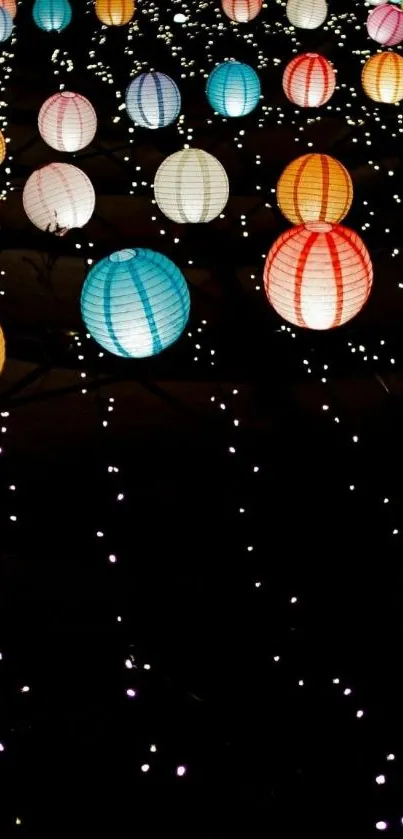 Colorful paper lanterns glowing against a dark background.