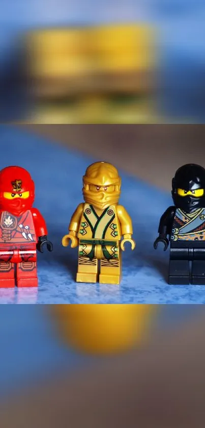 Three colorful LEGO ninjas on display.