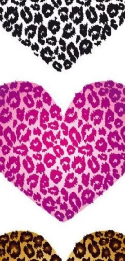 Three leopard print hearts in black, pink, and gold on white background.