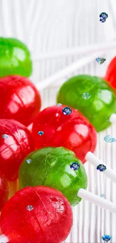 Colorful lollipops on white wooden background.