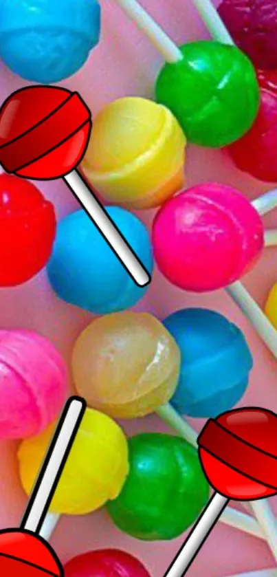 Colorful lollipops on a pink background wallpaper.