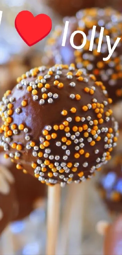 Chocolate lolly pops with colorful sprinkles and heart shapes.