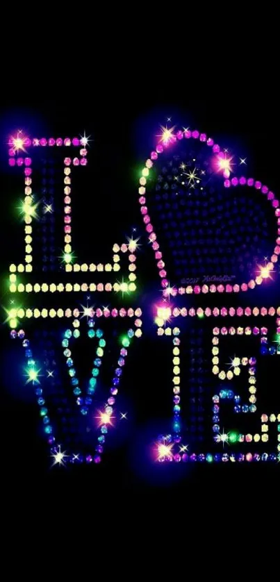 Colorful neon love design on a black background featuring heart and letters.